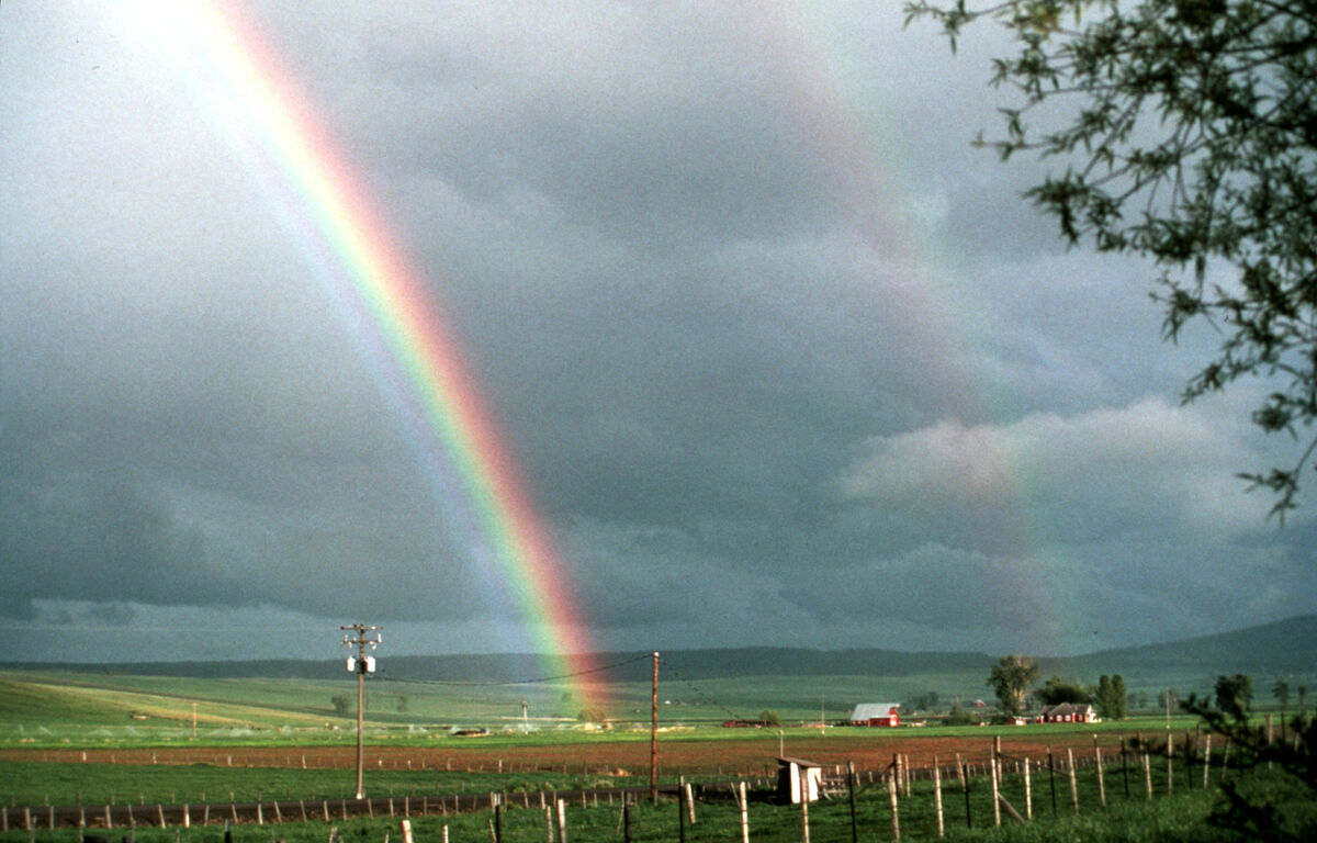 Double rainbow over Locke’s place on Prairie Creek, looking east towards the breaks of the canyons. Taken by Janie Tippett.